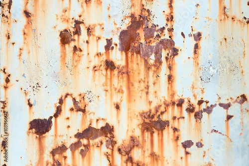Old painted metal texture with traces of rust photo