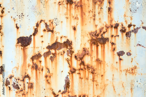 Old painted metal texture with traces of rust photo