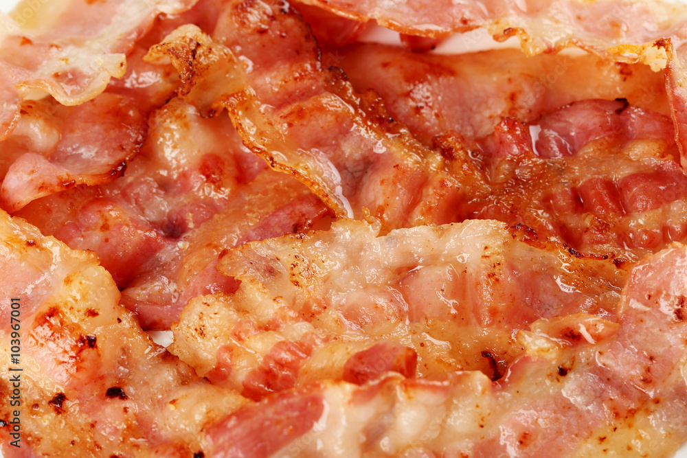 Crispy strips of bacon background, close up Crispy strips of bacon background, close up