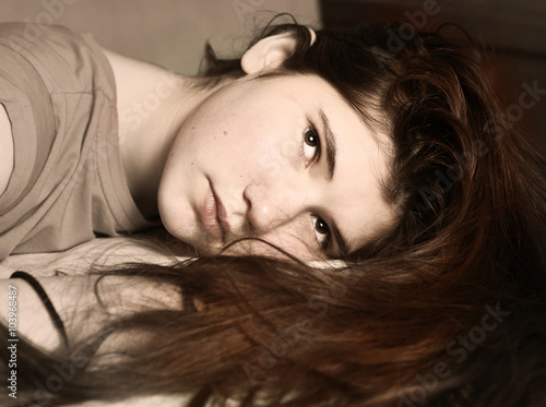 teenage pretty girl with brown long hair photo