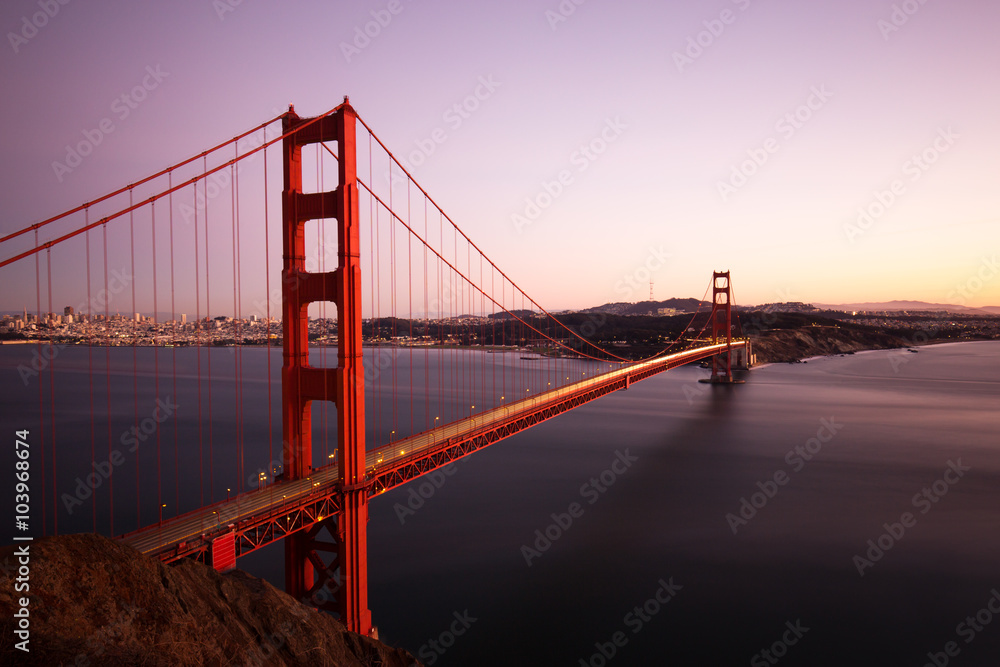 gold gate bridge in blue sky at dawn