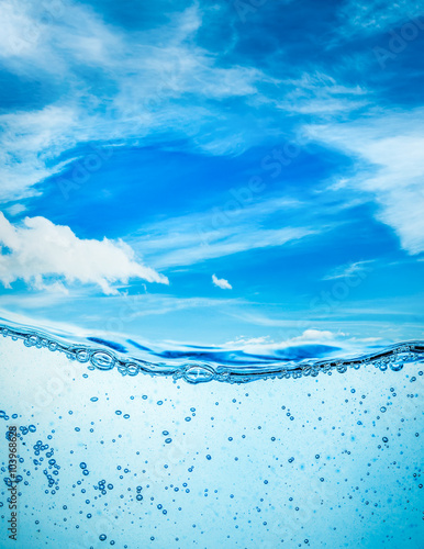 Fototapeta Naklejka Na Ścianę i Meble -  Close up water on a background of blue sky