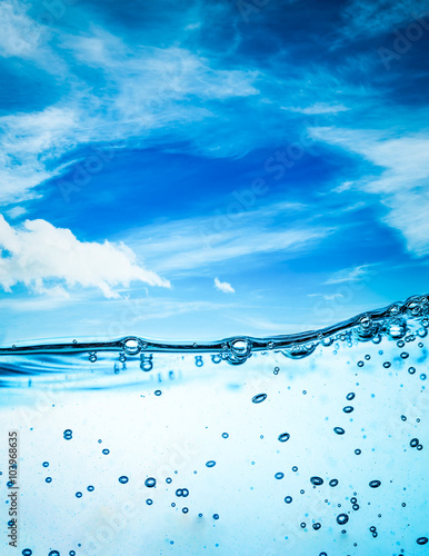 Close up water on a background of blue sky