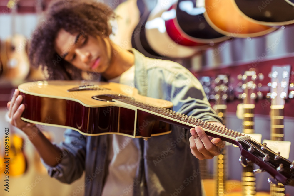 Man in musical shop Man in musical shop