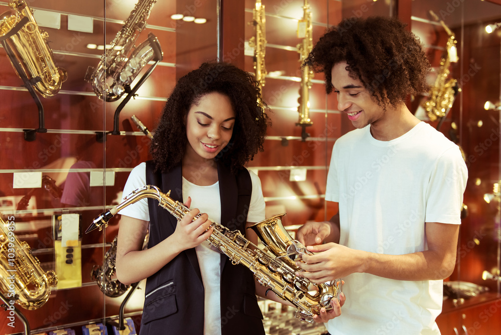Obraz premium People in musical shop