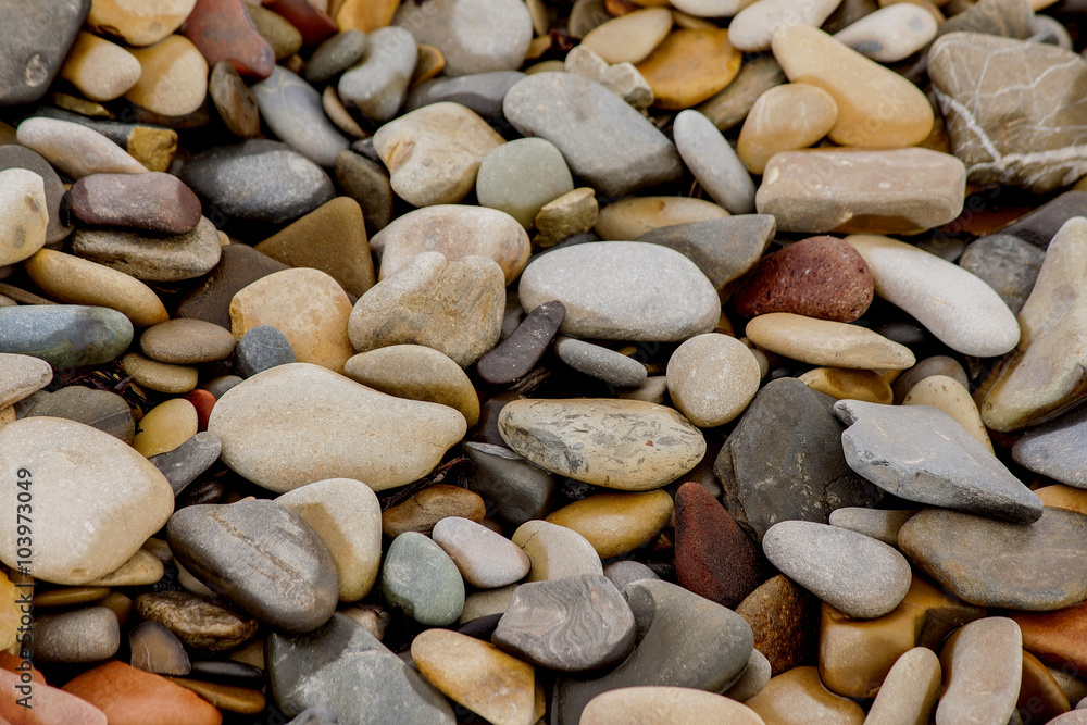 Round smooth stones of different color Round smooth stones of different color
