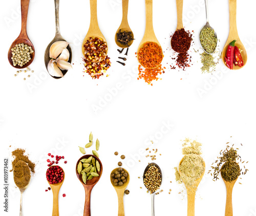 Fototapeta Naklejka Na Ścianę i Meble -  Spices in spoons isolated on white background.