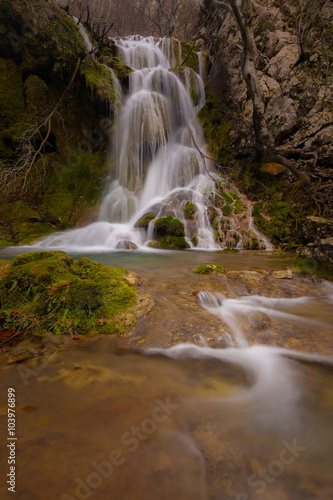 Beautiful waterfalls and mountain stream in Transylvania  in early spring