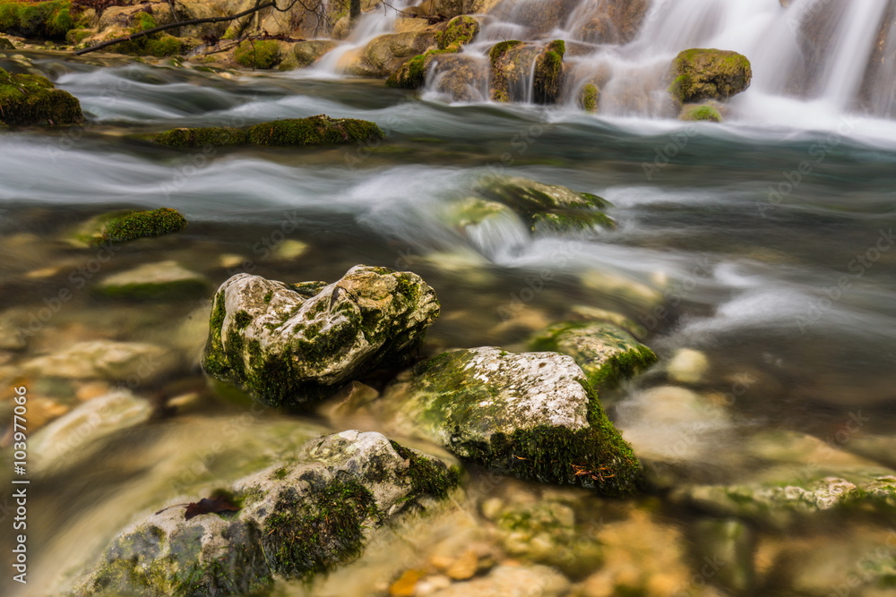 Beautiful waterfalls and mountain stream in Transylvania, in early spring Beautiful waterfalls and mountain stream in Transylvania, in early spring
