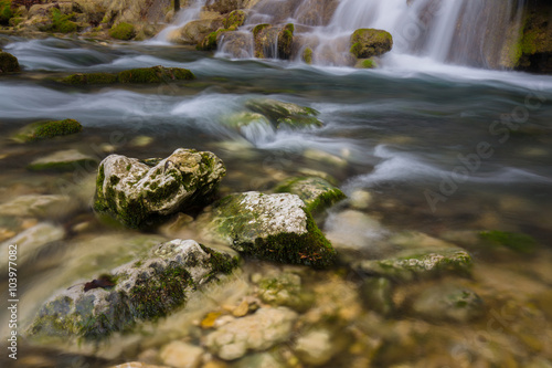 Beautiful waterfalls and mountain stream in Transylvania  in early spring