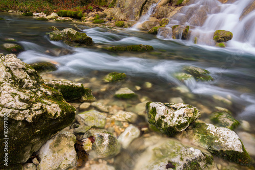 Beautiful waterfalls and mountain stream in Transylvania, in early spring