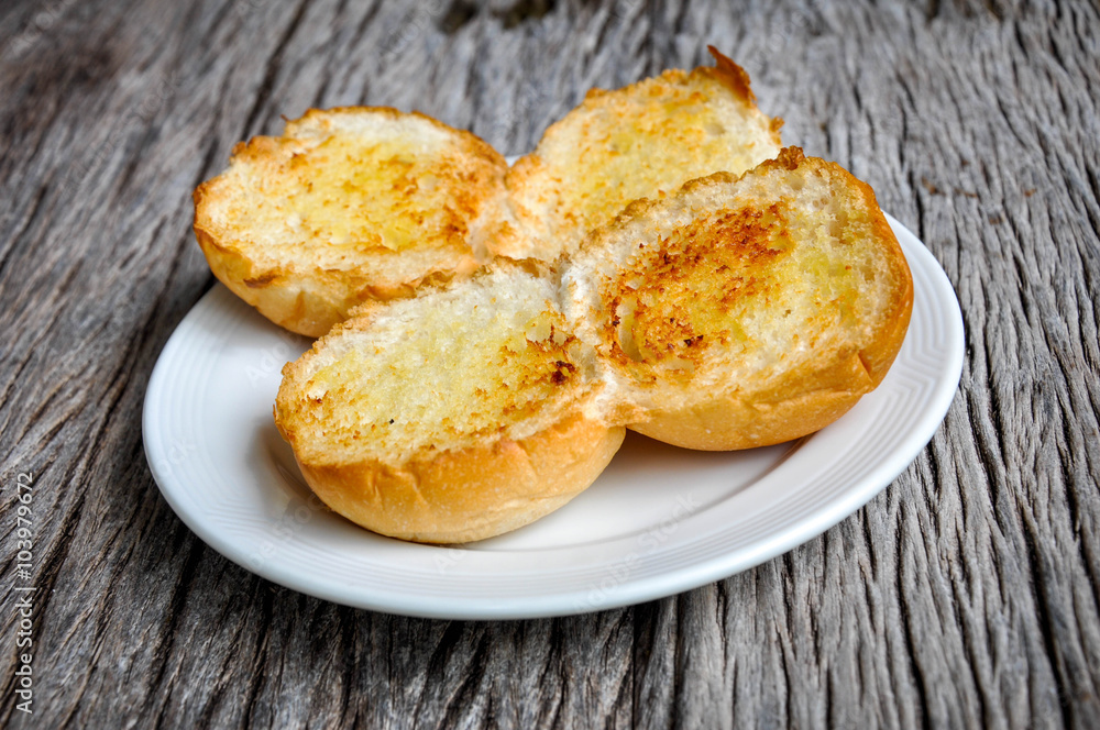 Garlic bread on the plate. Garlic bread on the plate.