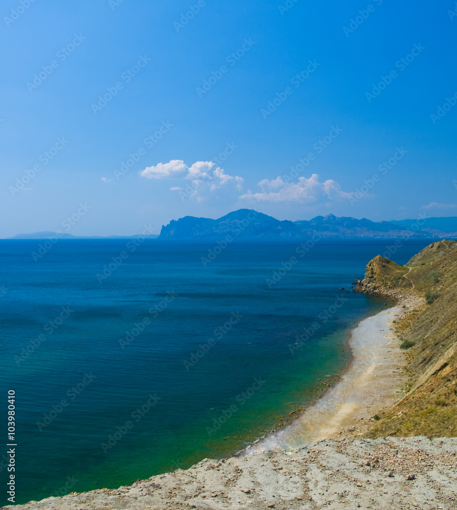 Beach of the sea. View of top mountain