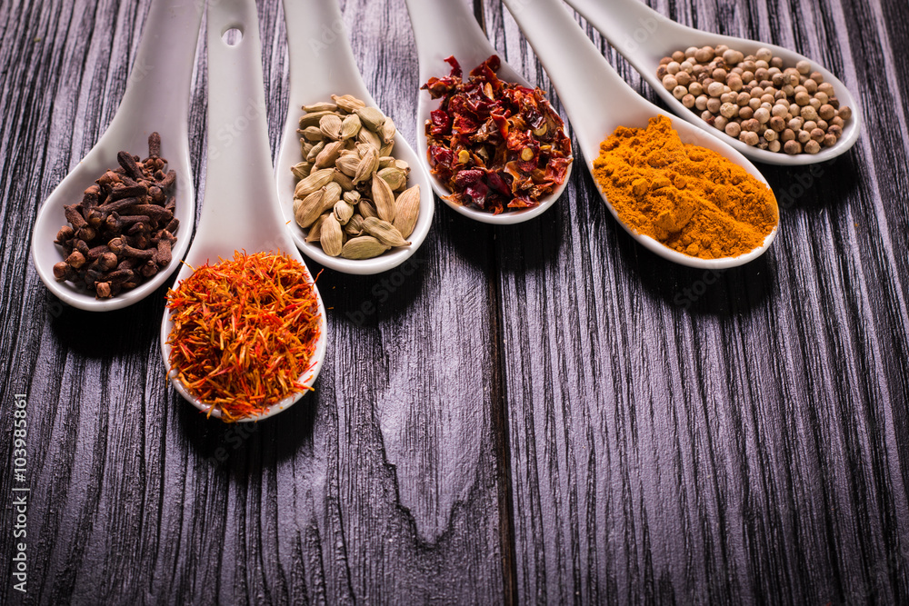 spices and herbs on wooden table , medicinal concept