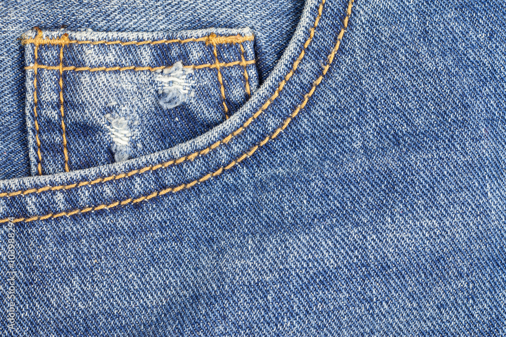 Blue torn denim pocket background. Blue torn denim pocket background.