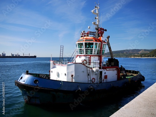 Tugboat in Port M, Harbor Tug underway to towing operation in port.