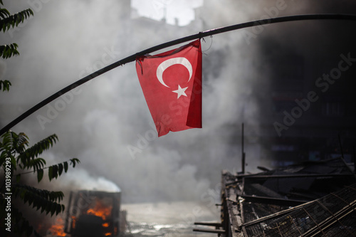 Turkish flag amidst riot photo