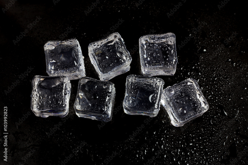 ice cubes on black background. ice cubes on black background.