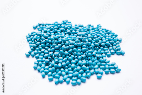 Blue colorful beads isolated on white background