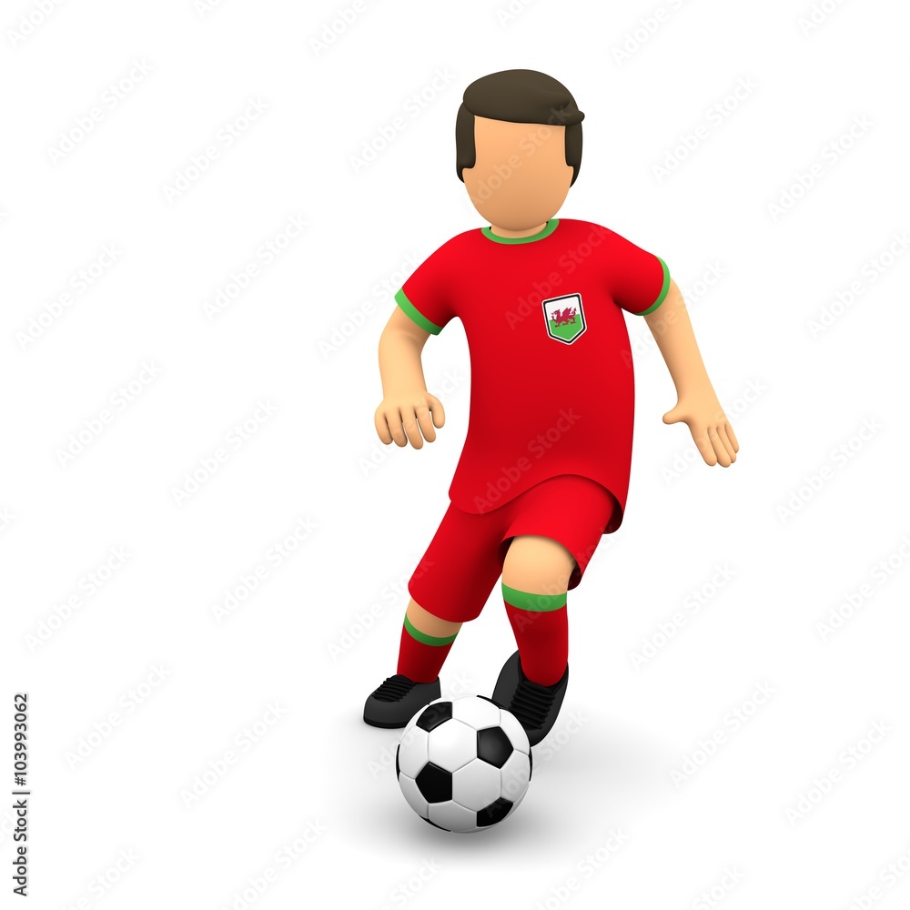 Walisische Fußballer läuft mit dem Ball Walisische Fußballer läuft mit dem Ball