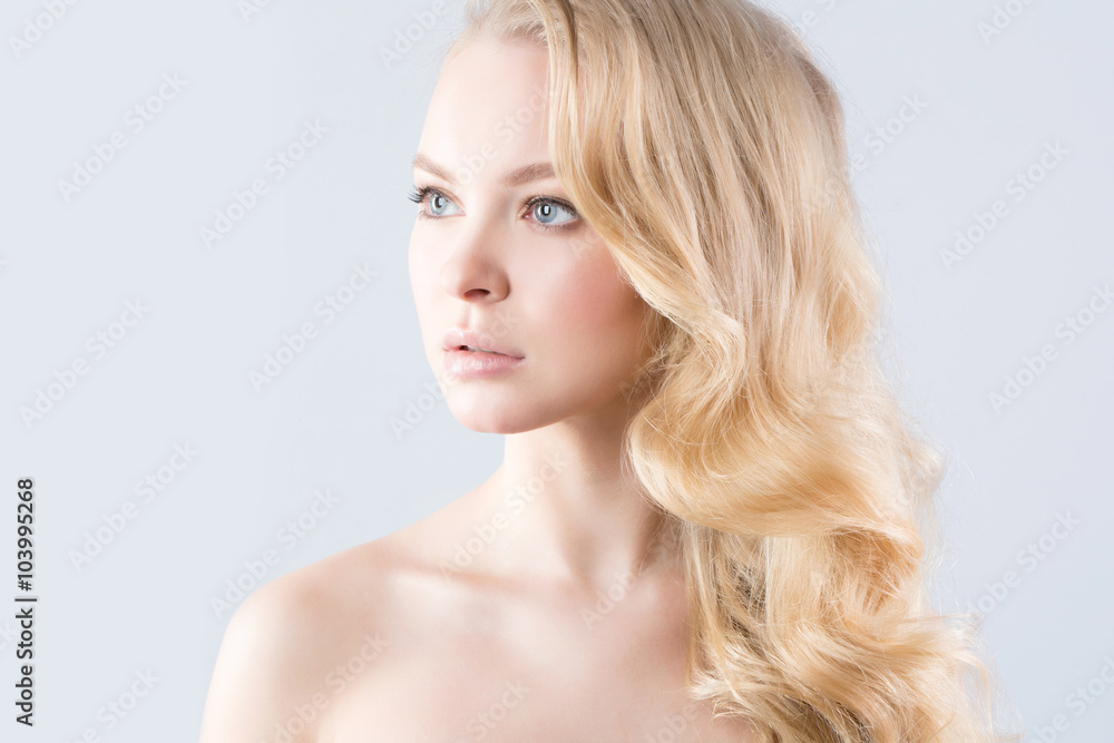 Fototapeta premium Portrait of beautiful blonde. Health and Beauty.