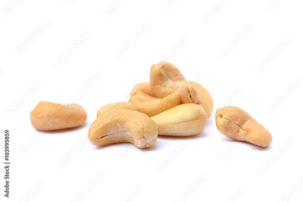 Peeled salted cashews isolated on a white background Peeled salted cashews isolated on a white background