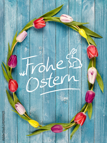 Fototapeta Naklejka Na Ścianę i Meble -  Frohe Ostern greeting card with tulip wreath