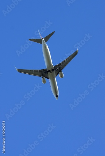 Airplane under blue sky