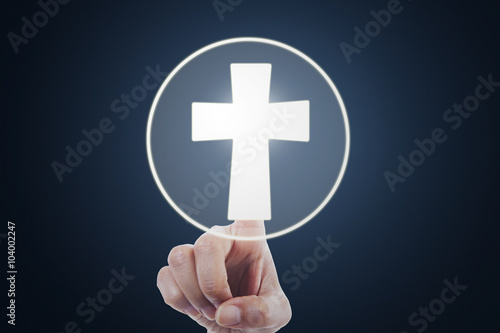 Hand pressing a cross symbol on virtual screen