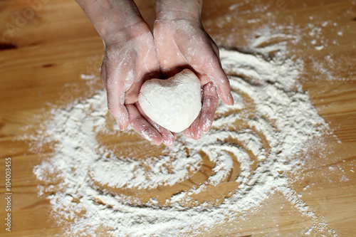 favorite dish for the holiday/the heart of the dough in the hands of chef pastry