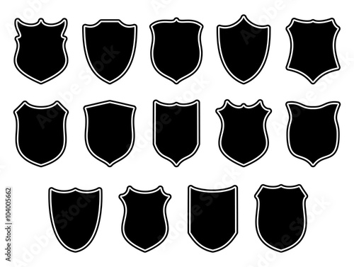 Large set of shields over grey background