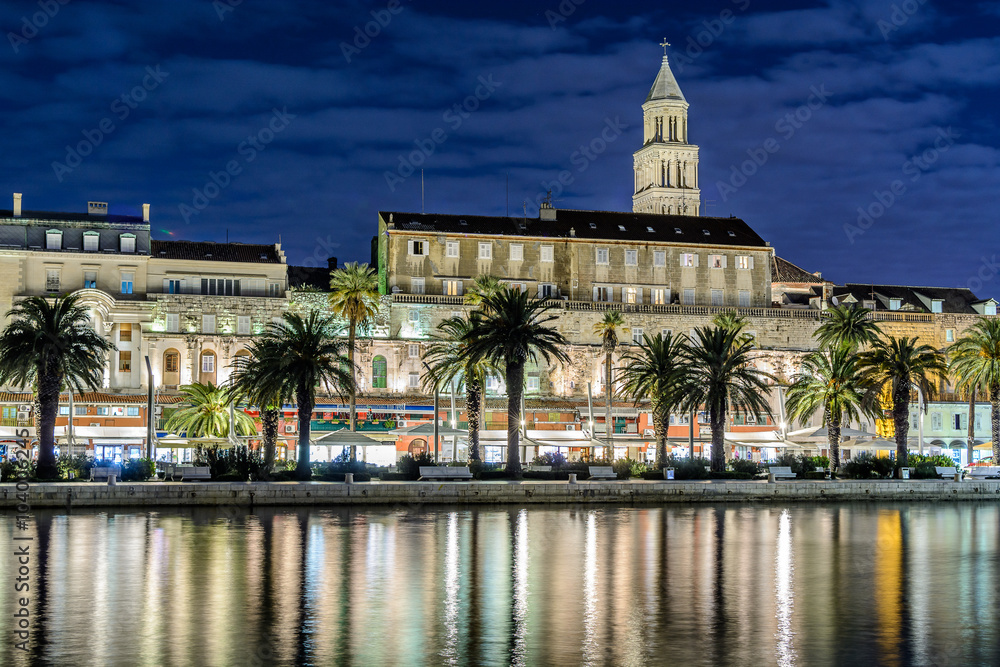 Promenade of city of Split in Croatia. / Waterfront cityscape of town of Split during night, long exposure.
