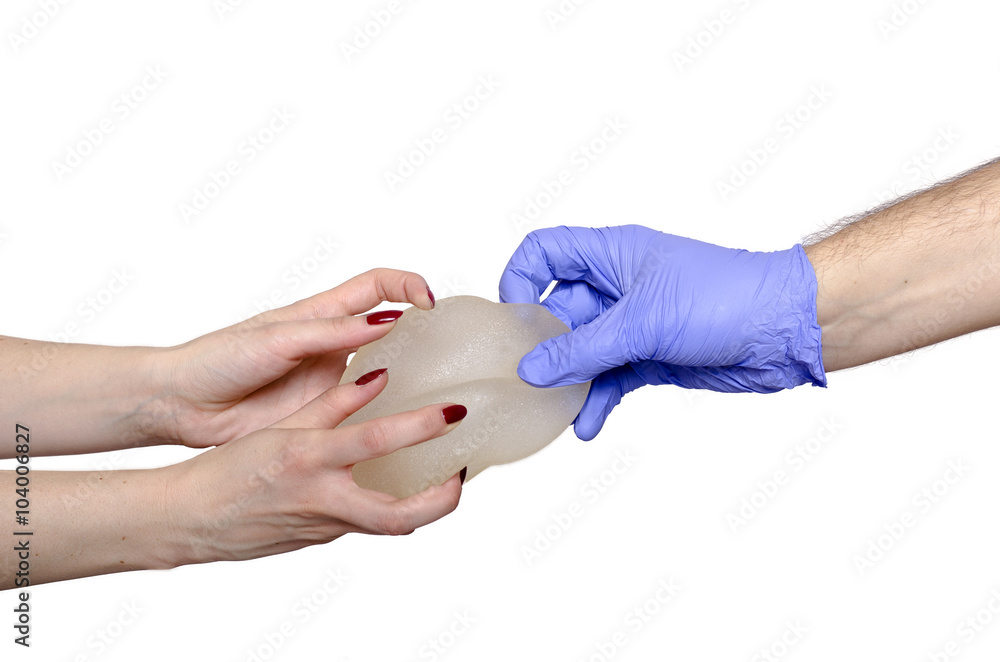 Silicone breast implant. Plastic surgery concept. Aesthetic surgery concept Silicone breast implant. Plastic surgery concept. Aesthetic surgery concept
