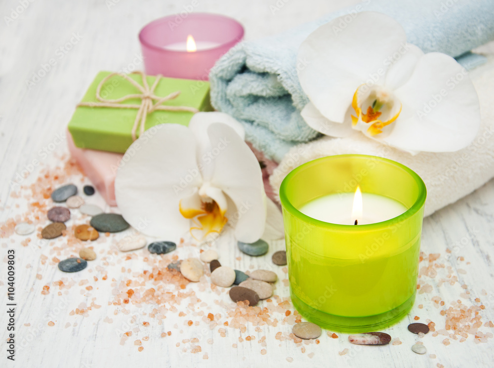Orchids, candle, towel and handmade soap Orchids, candle, towel and handmade soap