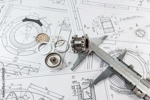 Technical drawing and caliper parts - steel and gear.