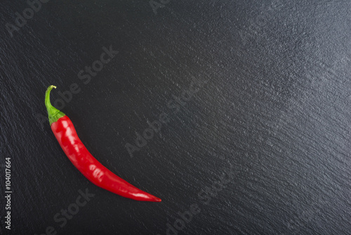 farm fresh chilli, red chilli, black background