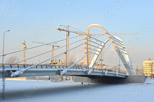   onstruction cranes and Lazarevsky bridge