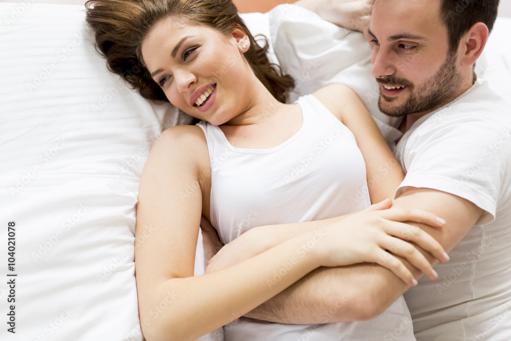 Loving couple in the bed Loving couple in the bed