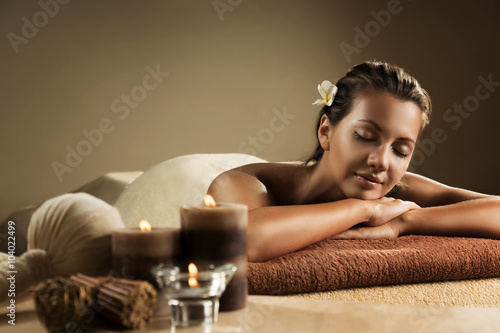 The girl relaxes in the spa salon