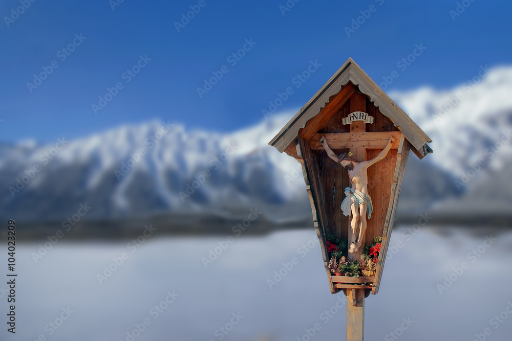 crucifix in the mountains