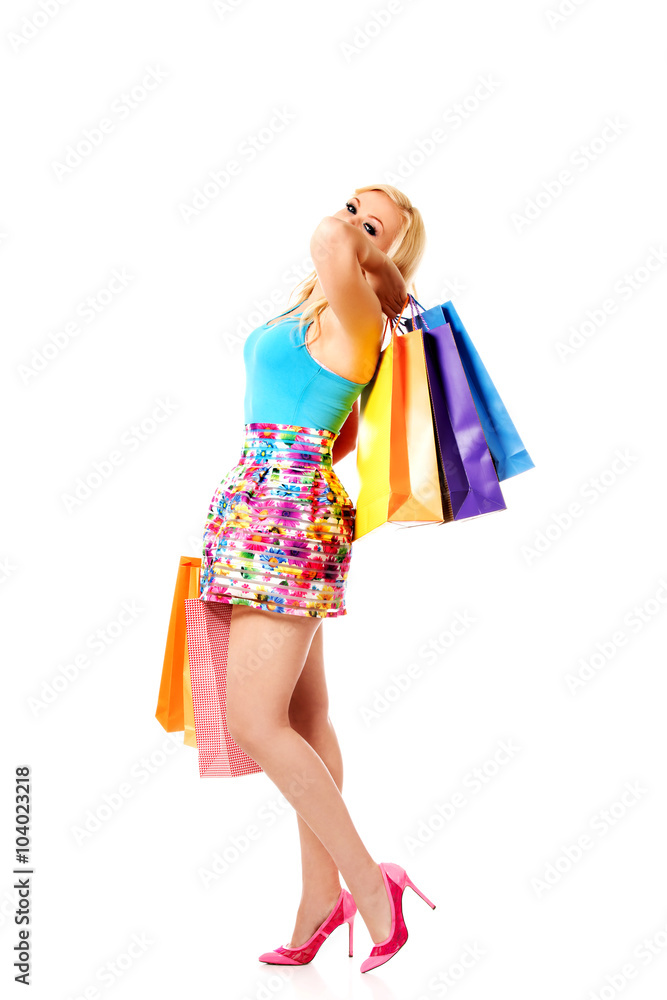 Happy woman holding a shopping bags