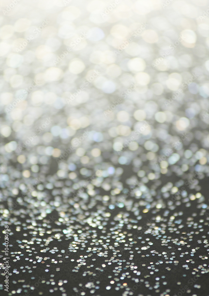 Unfocused abstract glitter holiday bokeh. silver golden lights. celebration card background. Unfocused abstract glitter holiday bokeh. silver golden lights. celebration card background.