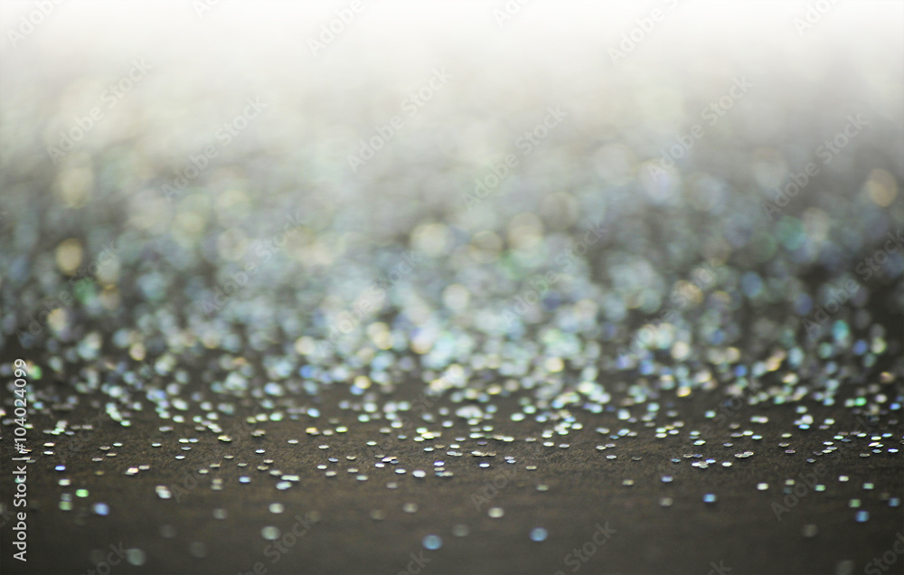 Unfocused abstract glitter holiday bokeh. silver golden lights. celebration card background. Unfocused abstract glitter holiday bokeh. silver golden lights. celebration card background.