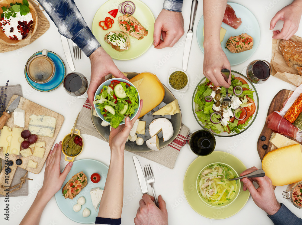 View from above the table of people eating