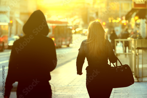 Принти на полотні Woman being followed