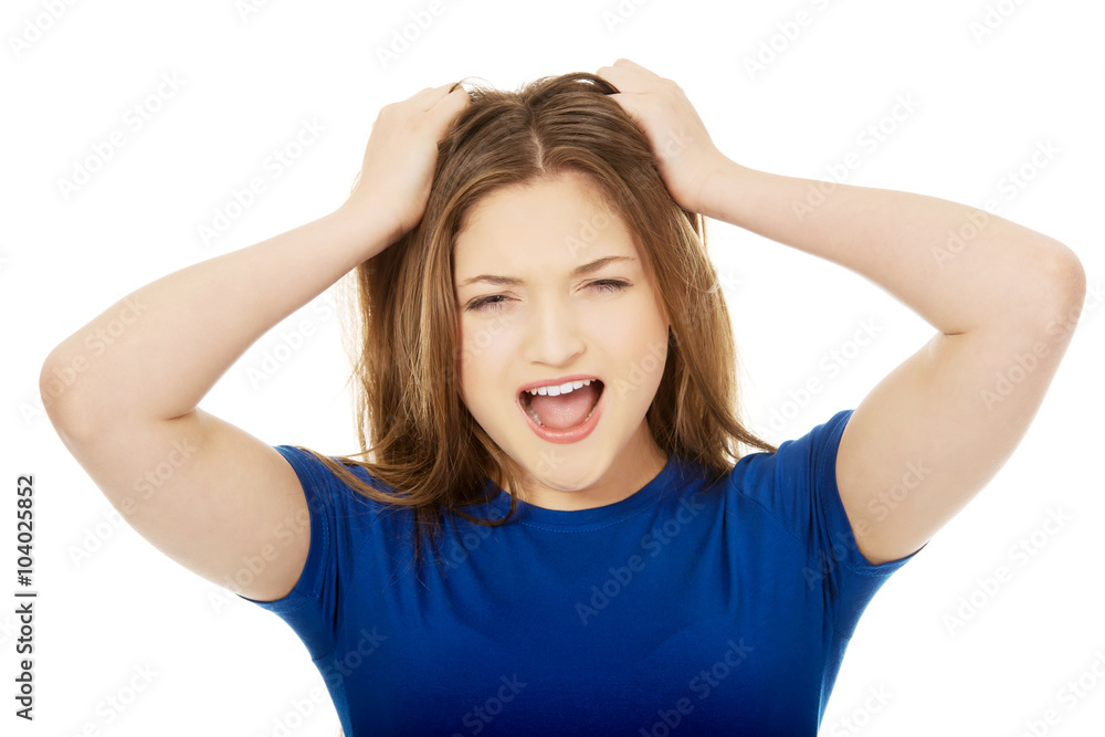 Frustrated young woman screaming. Frustrated young woman screaming.