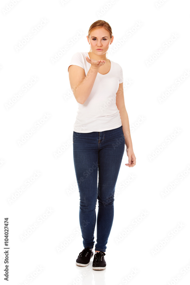 Young woman sending a kiss Young woman sending a kiss