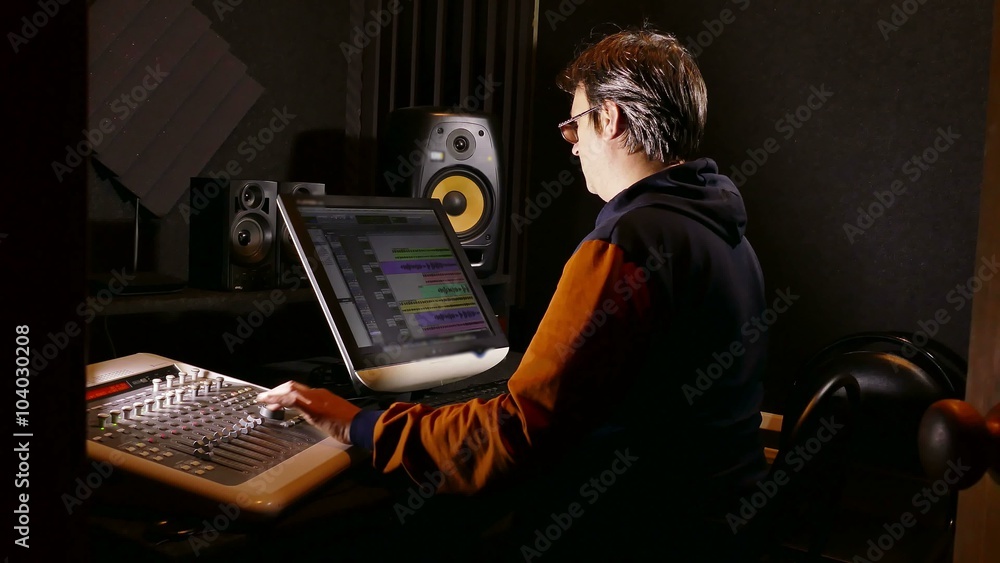 man sound designer in his recording studio man sound designer in his recording studio