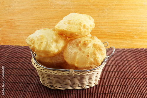 Canvastavla puri or Poori traditional indian homemade deep fried bread or chapati