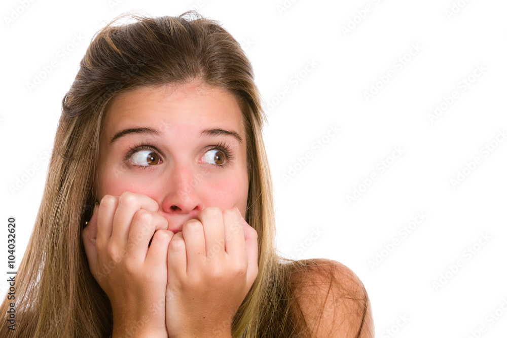 Hispanic young woman with fear expression and hands on face Hispanic young woman with fear expression and hands on face